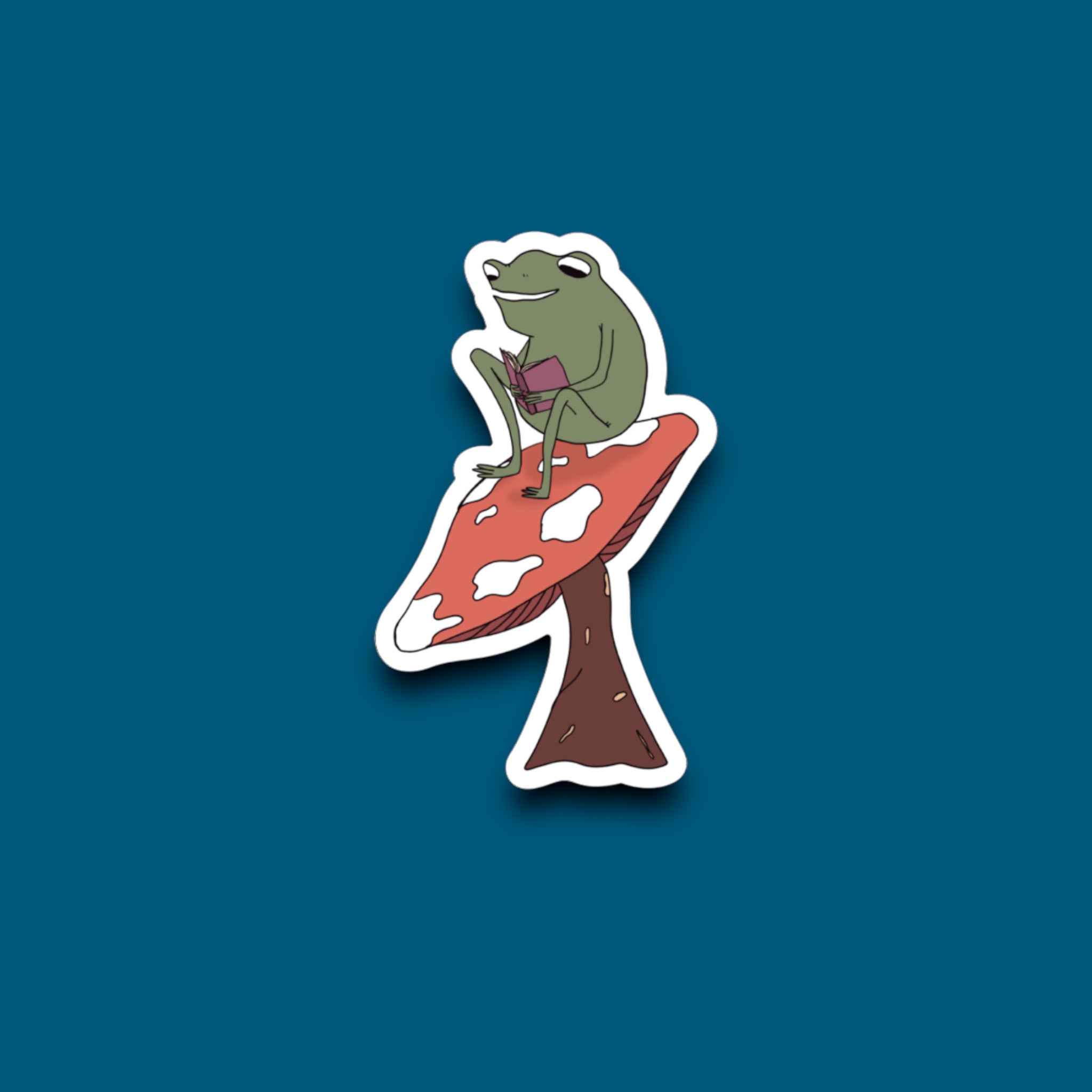 Reading On A Mushroom Frog Sticker (K12) Blue Bison Apparel